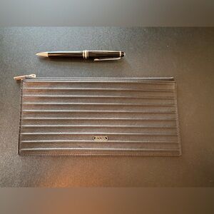 Quiet luxury Rimowa travel pouch